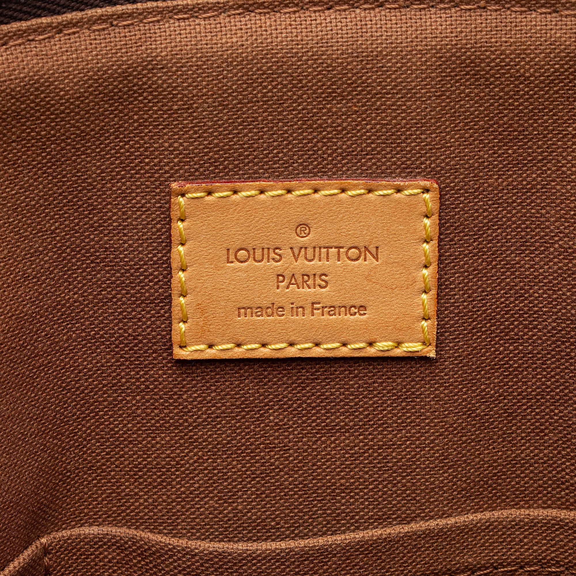 Louis Vuitton Monogram Canvas Tivoli GM Satchel (SHF-zfZGz0)