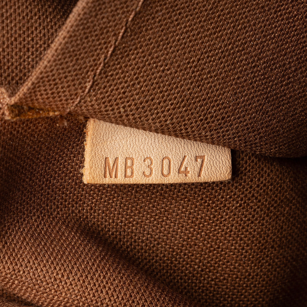 Louis Vuitton Monogram Canvas Tulum GM Shoulder Bag (SHF-buaNZA)