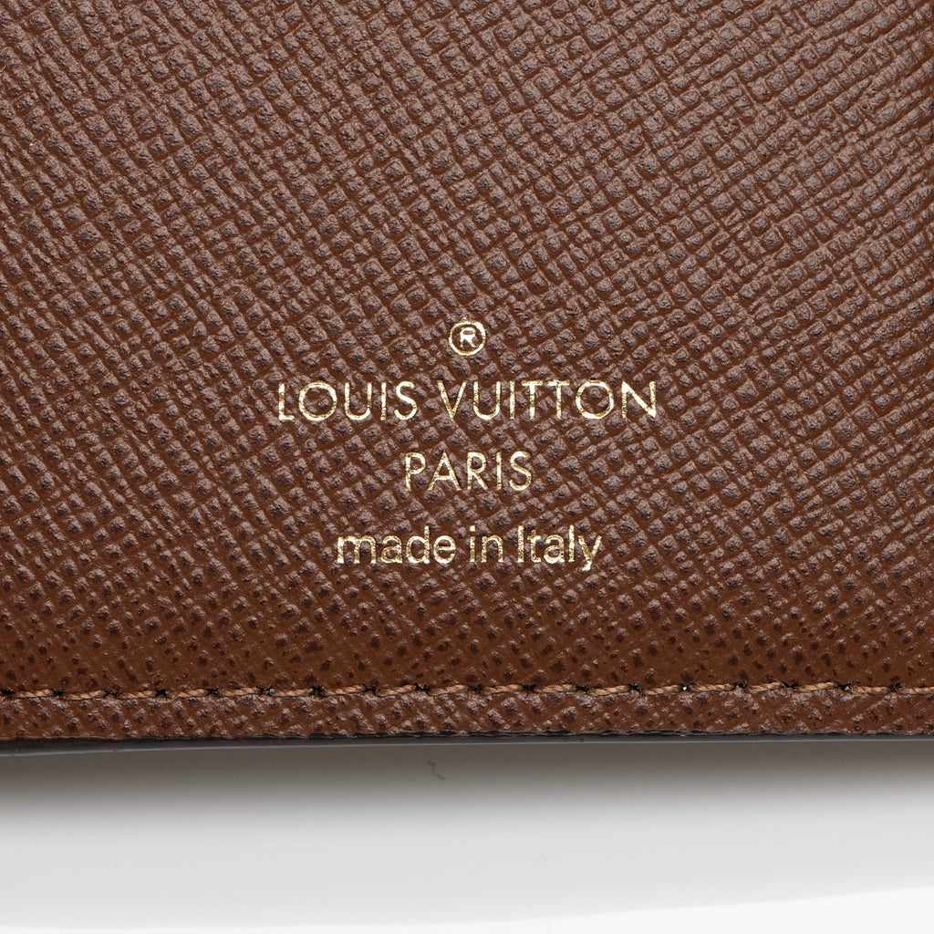 Louis Vuitton Monogram Canvas Victorine Wallet (SHF-975LnN)