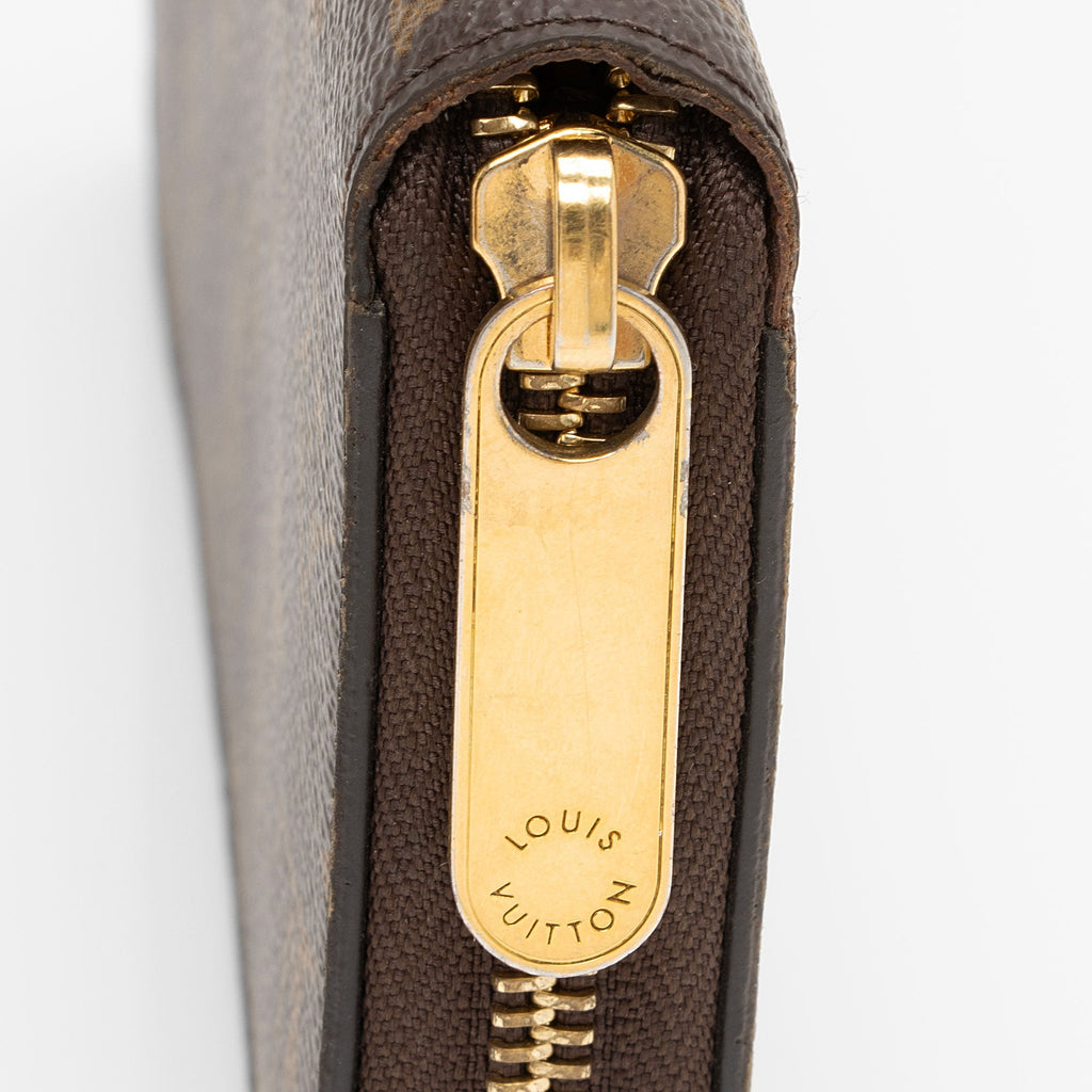 Louis Vuitton Monogram Canvas Zippy Wallet (SHF-JxPPMQ)
