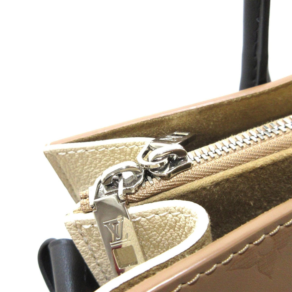 Louis Vuitton Monogram Cuir Plume Very MM Tote (SHG-lAPpQs)