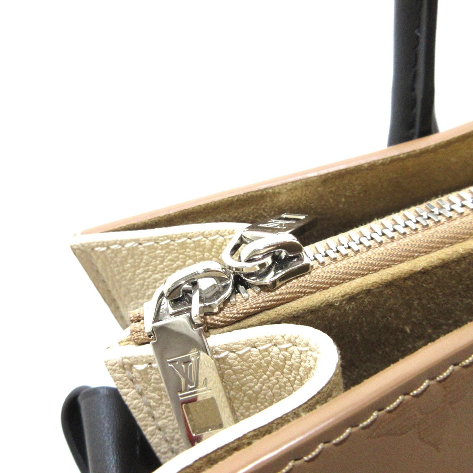Louis Vuitton Monogram Cuir Plume Very MM Tote (SHG-lAPpQs)