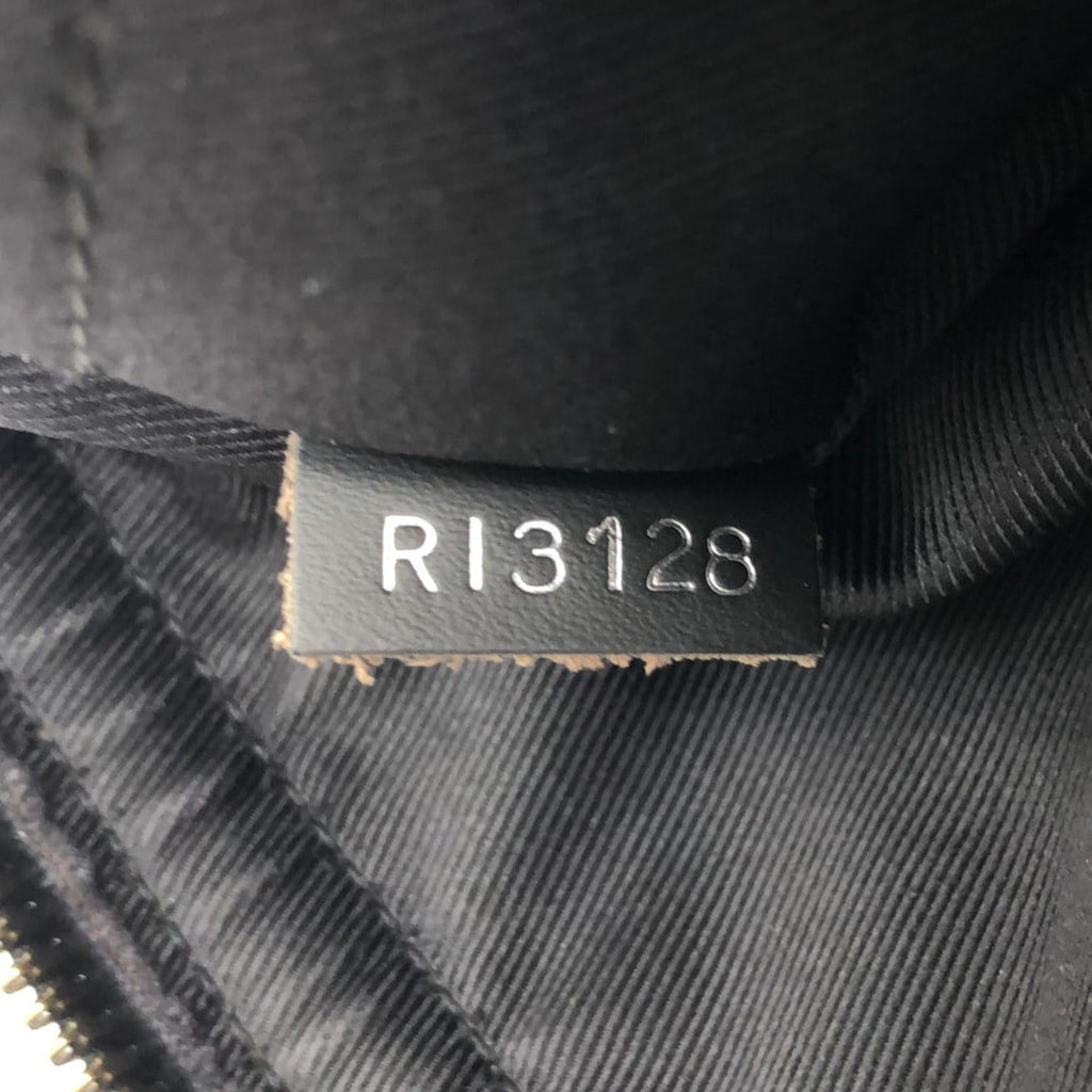 Louis Vuitton Monogram Eclipse Odyssey PM (SHG-OjYMvS)