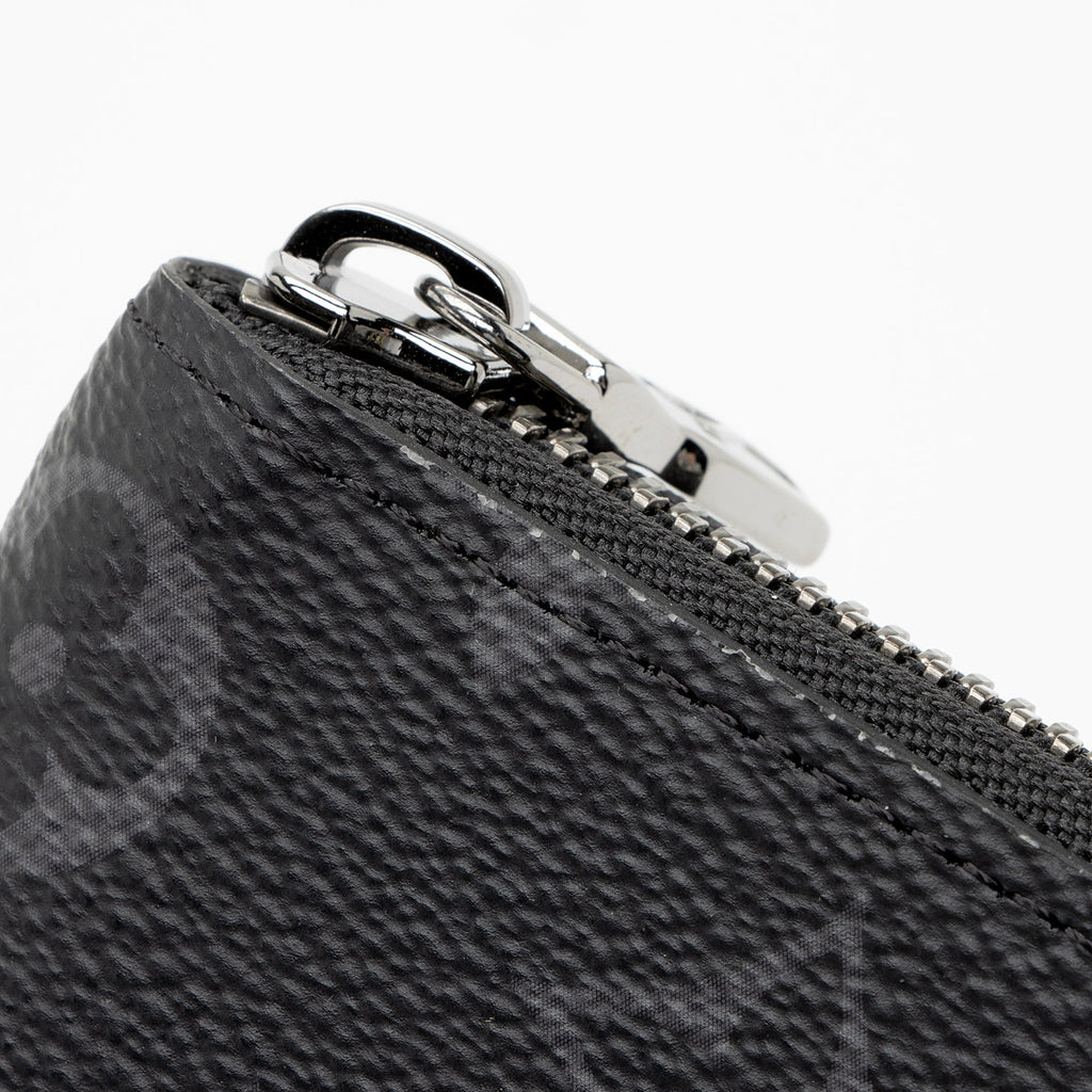 Louis Vuitton Monogram Eclipse Vertical Zippy Wallet (SHF-aUsvWA)