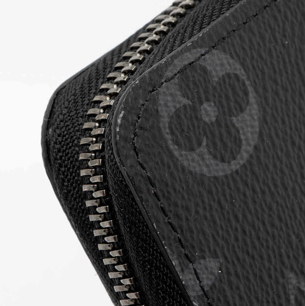 Louis Vuitton Monogram Eclipse Vertical Zippy Wallet (SHF-aUsvWA)