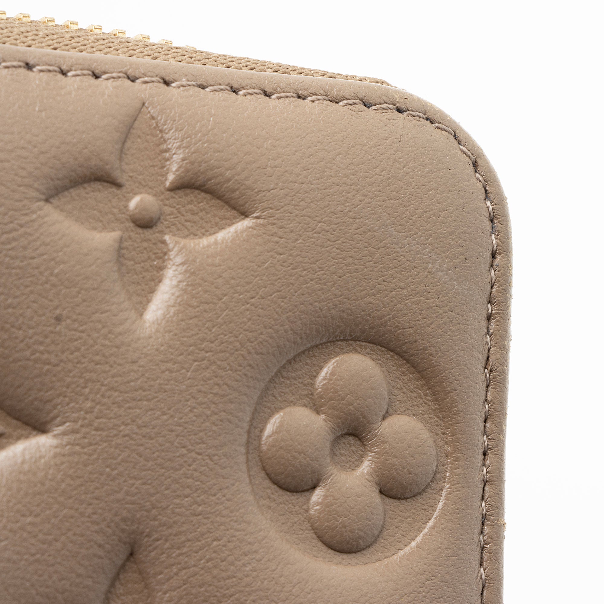 Louis Vuitton Monogram Embossed Lambskin Coussin Zippy Wallet