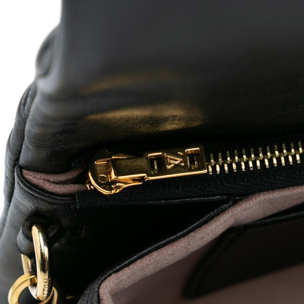 Louis Vuitton Monogram Embossed Pochette Coussin