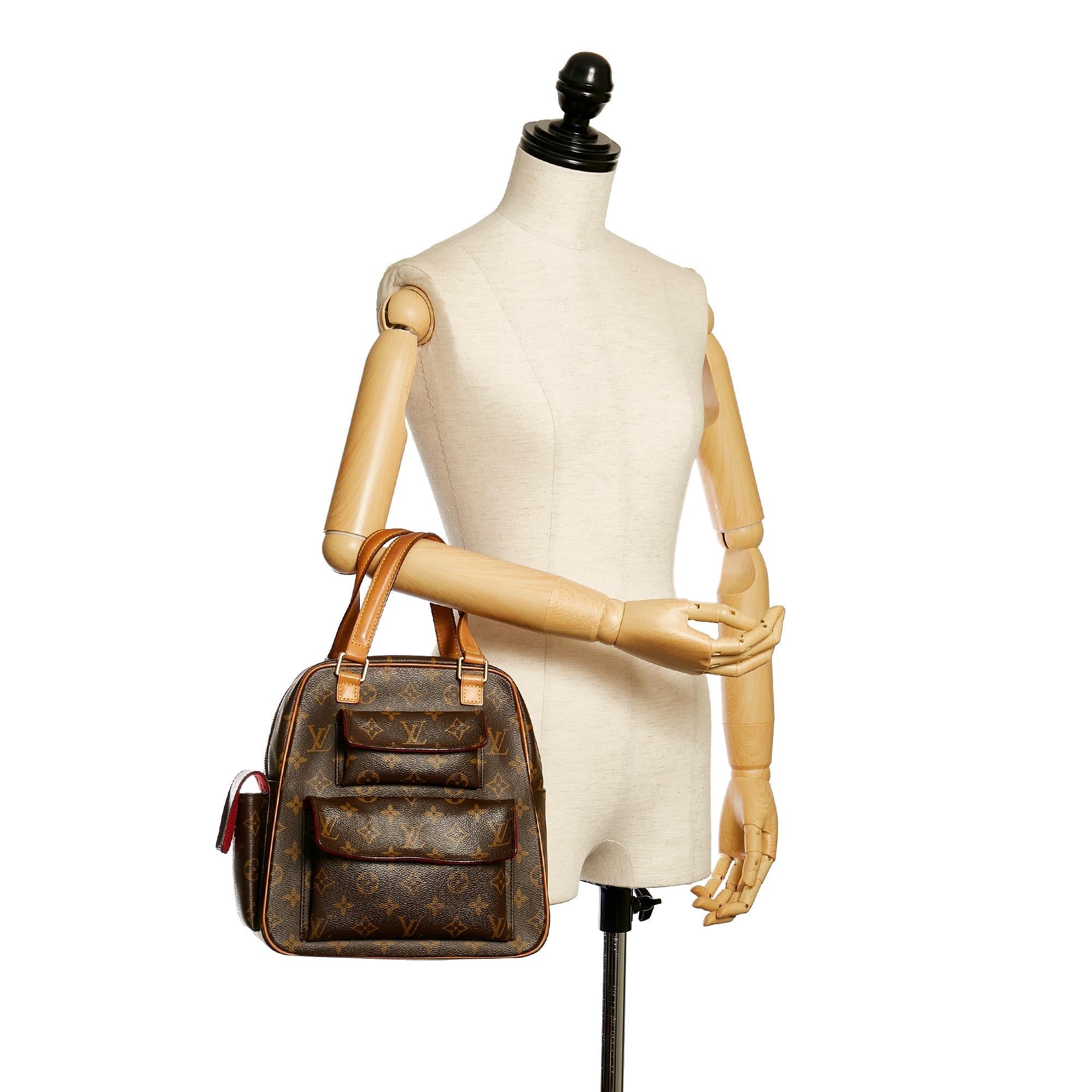 Louis Vuitton Monogram Excentri-Cite (SHG-dz2D0c)