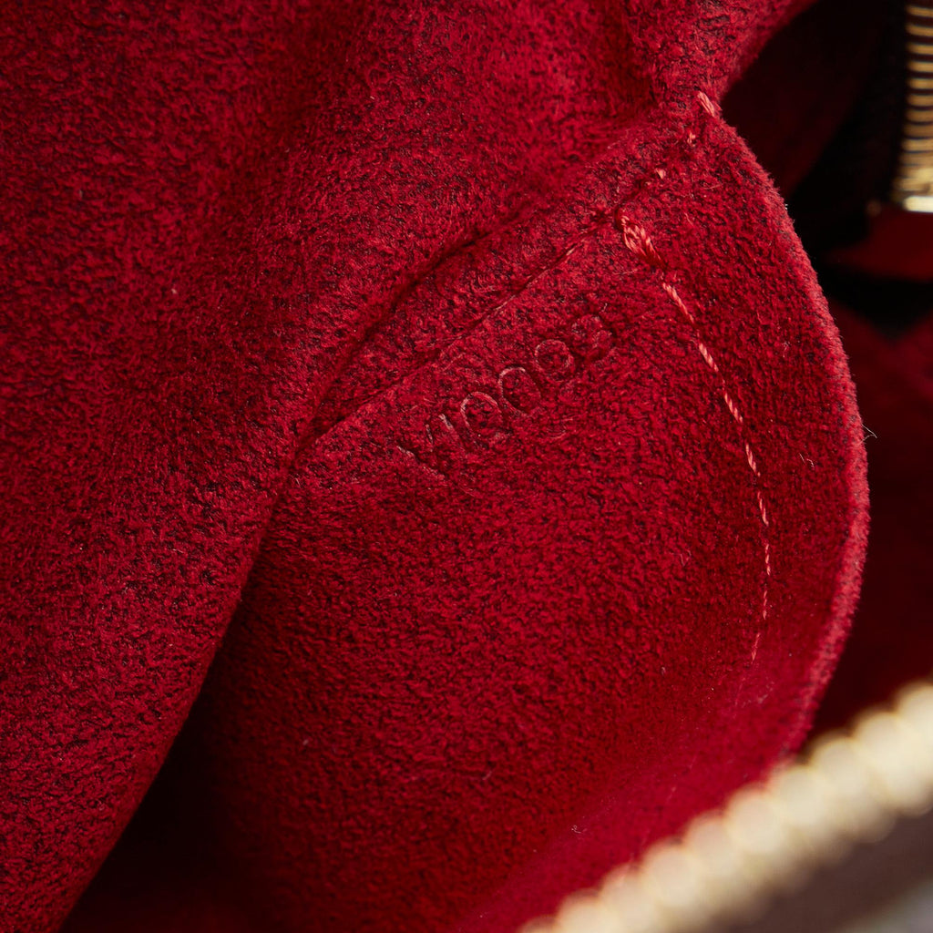 Louis Vuitton Monogram Excentri-Cite (SHG-SgdKMe)