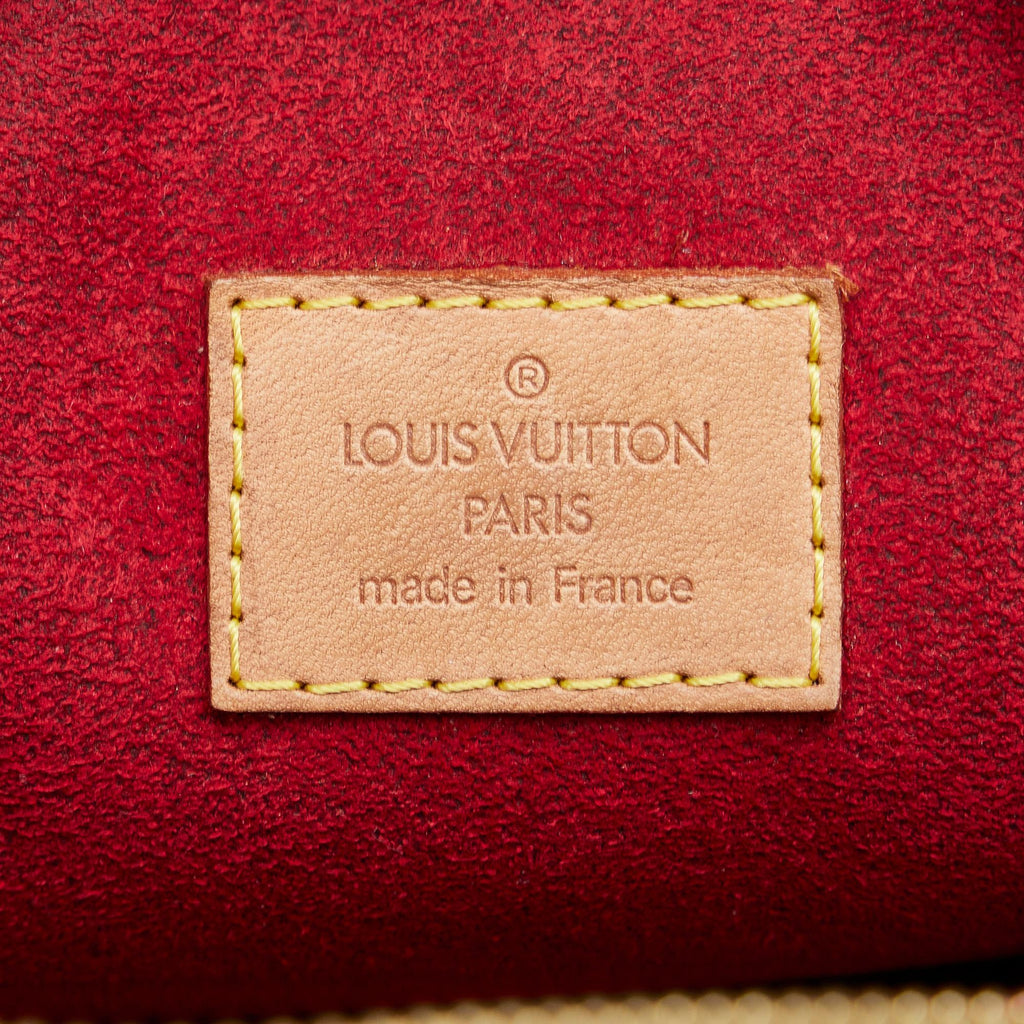 Louis Vuitton Monogram Excentri-Cite (SHG-SgdKMe)