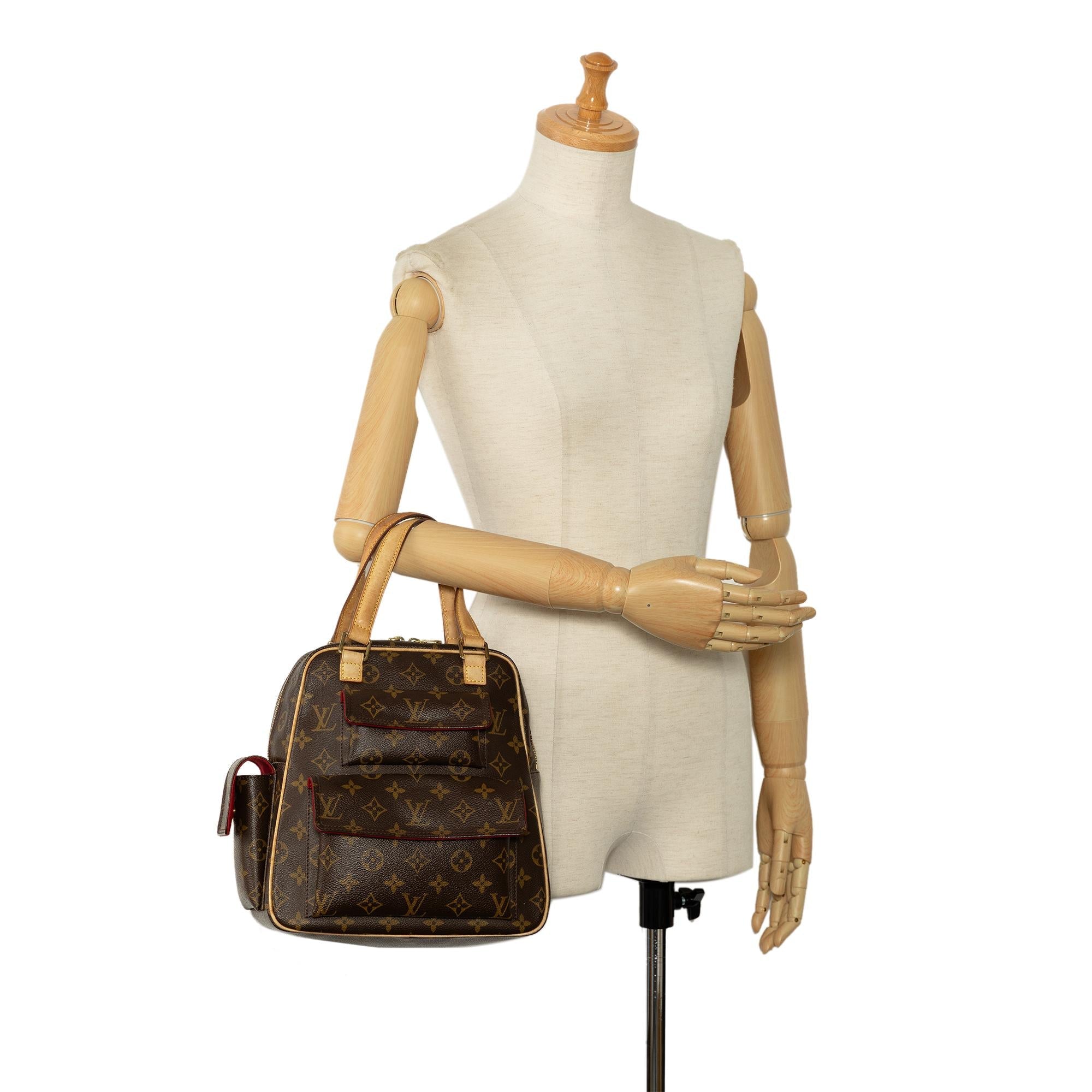 Louis Vuitton Monogram Excentri-Cite (SHG-IiJJA8)