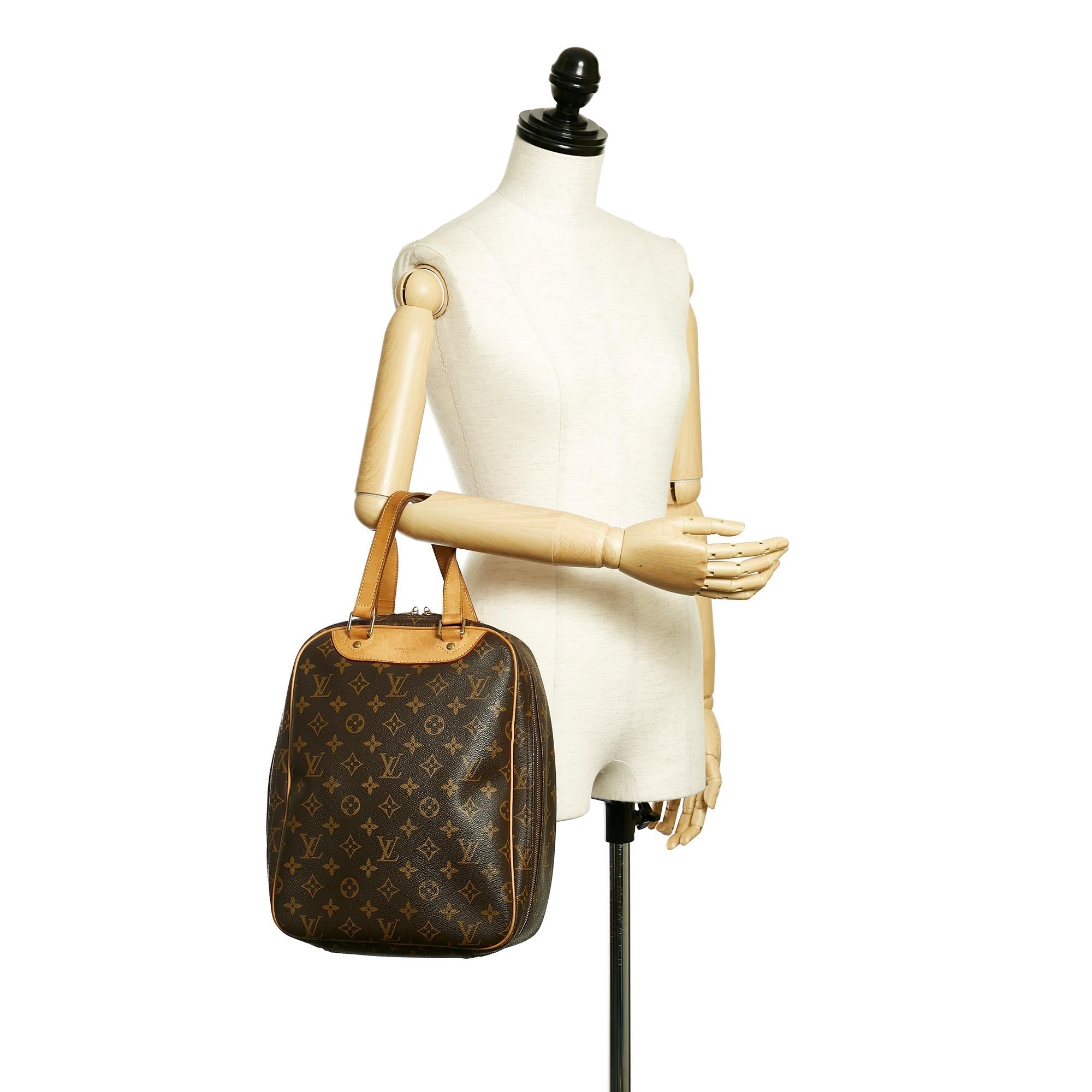 Louis Vuitton Monogram Excursion (SHG-34147)