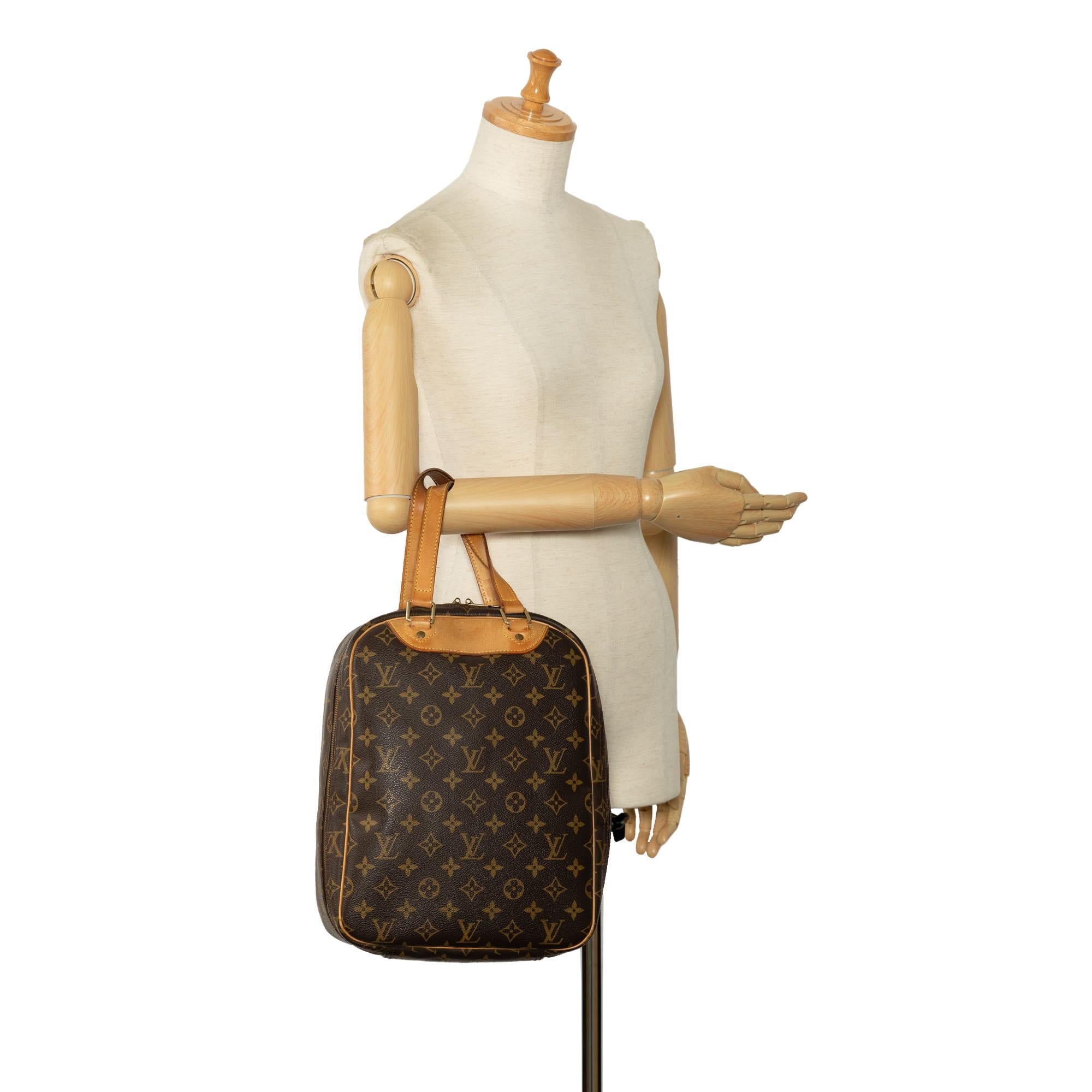 Louis Vuitton Monogram Excursion (SHG-nH0lUa)