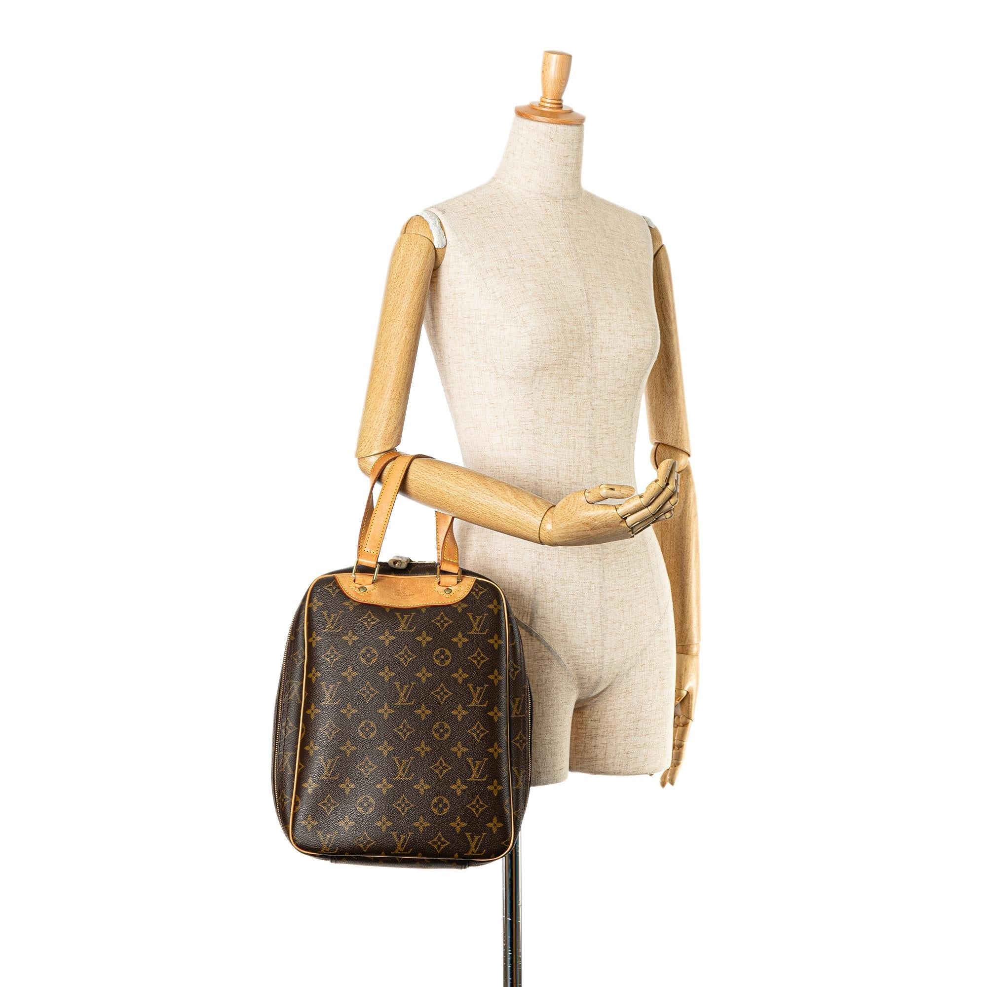 Louis Vuitton Monogram Excursion (SHG-tjIOpm)