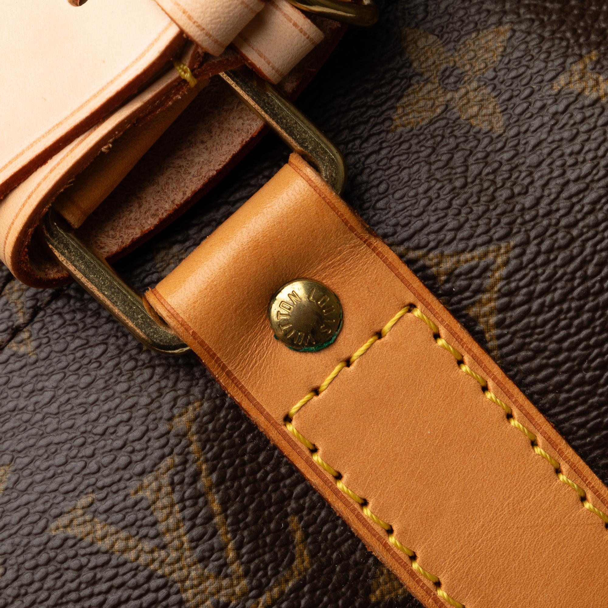 Louis Vuitton Monogram Keepall 50 (SHG-MDUYZV)