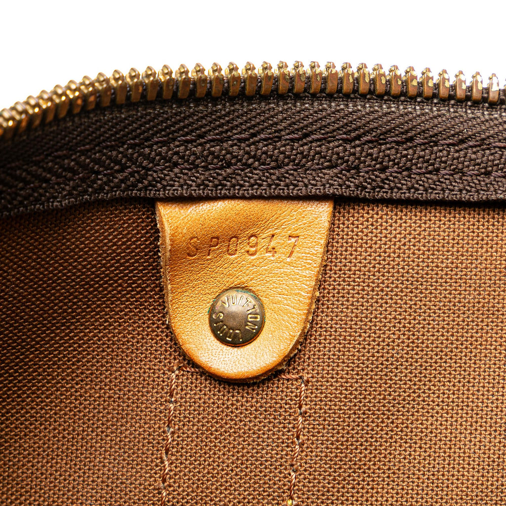 Louis Vuitton Monogram Keepall 50 (SHG-RvBq1W)