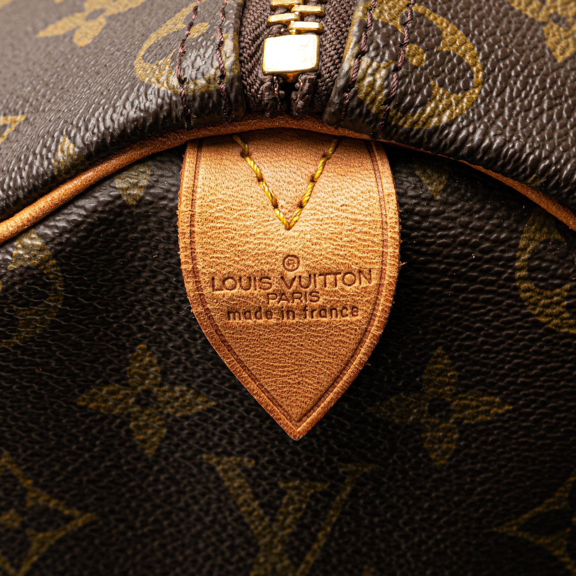 Louis Vuitton Monogram Keepall 50 (SHG-cVG0bL)
