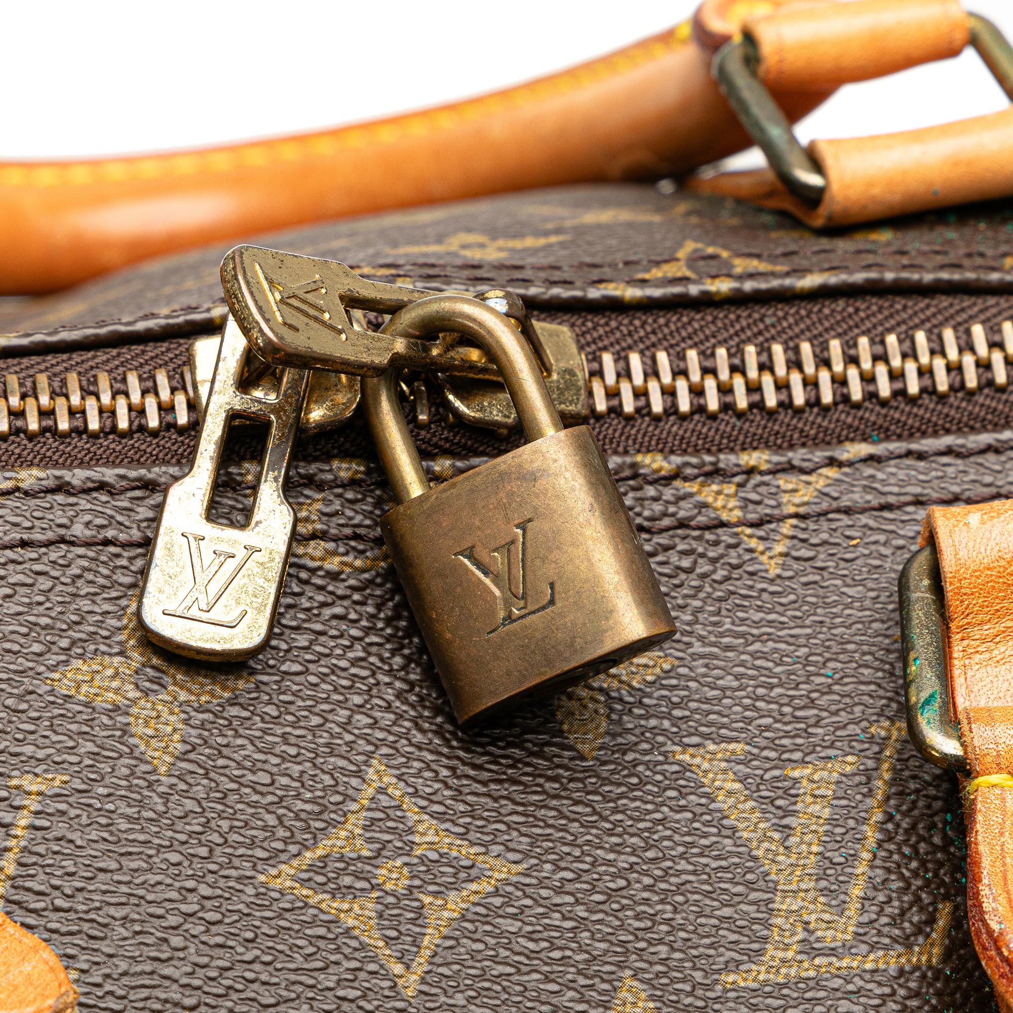 Louis Vuitton Monogram Keepall 50 (SHG-QgAigr)