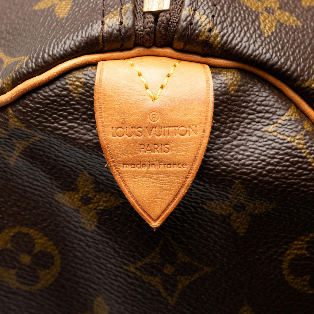 Louis Vuitton Monogram Keepall 55 (SHG-tk49AO)