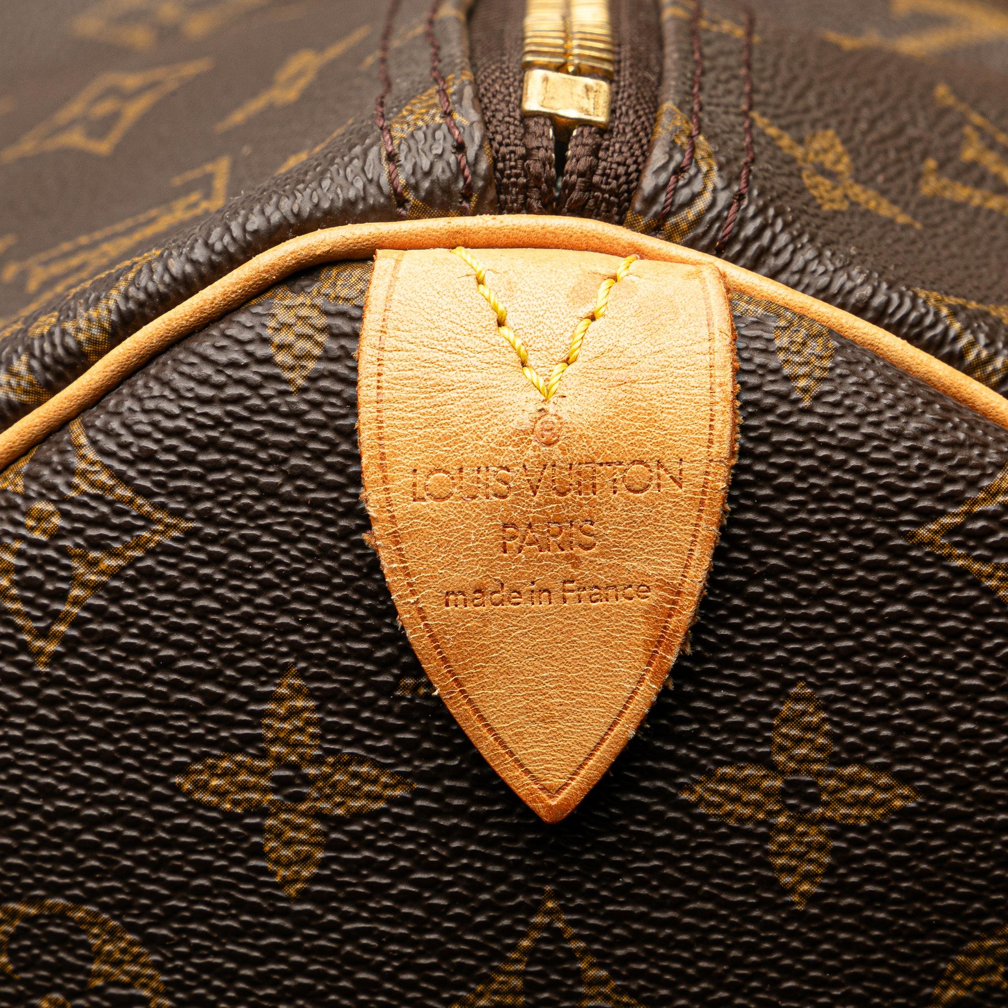 Louis Vuitton Monogram Keepall 55 (SHG-Cqs5RB)