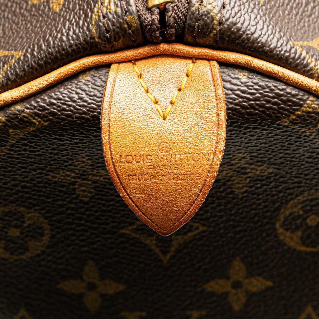 Louis Vuitton Monogram Keepall 55 (SHG-PU3gjf)