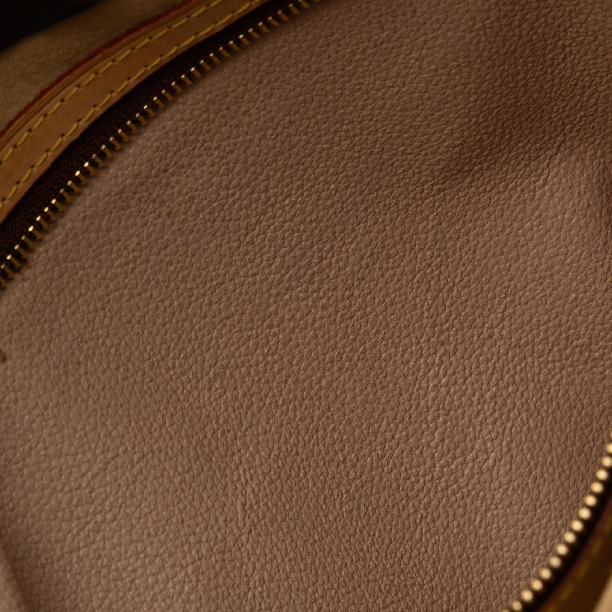 Louis Vuitton Monogram Luco (SHG-5fO3OI)