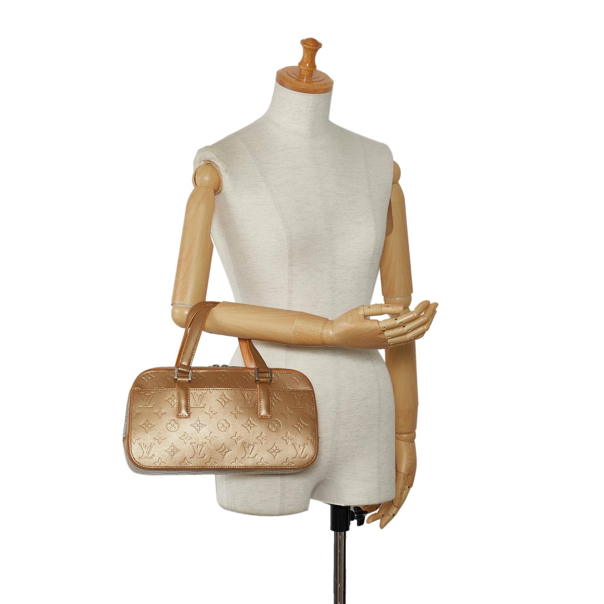 Louis Vuitton Monogram Mat Shelton (SHG-7zoHnr)