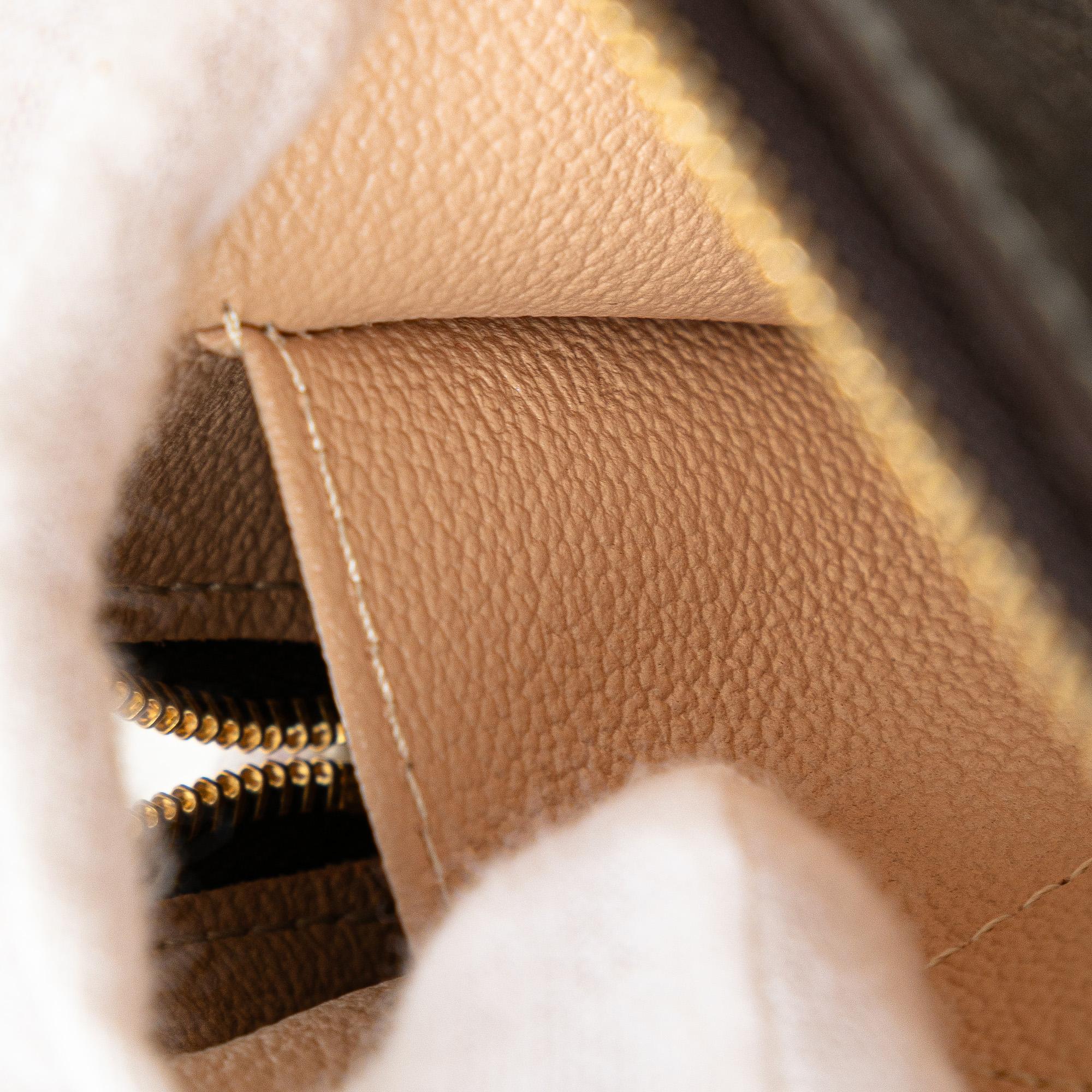 Louis Vuitton Monogram Mini Lin Cosmetic Pouch