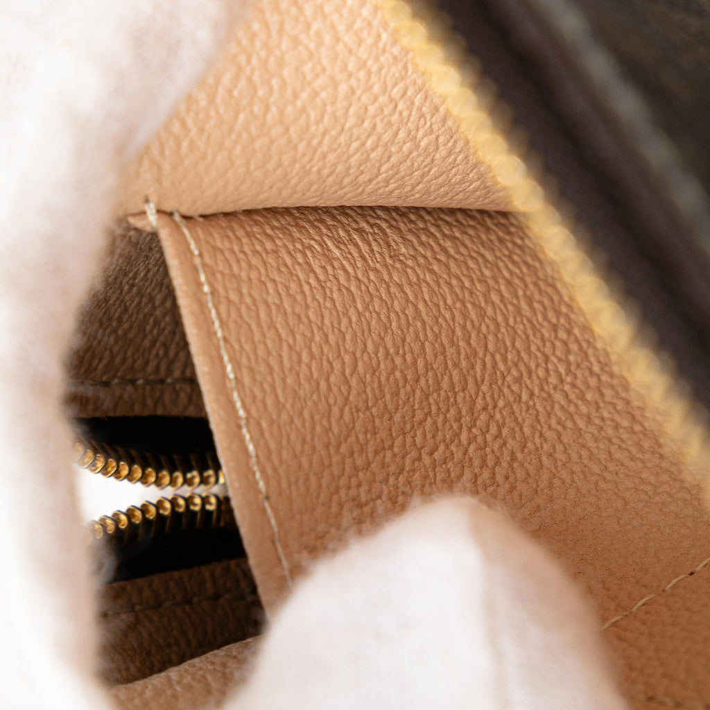 Louis Vuitton Monogram Mini Lin Cosmetic Pouch
