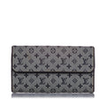 Louis Vuitton Monogram Mini Lin Porte Tresor International Wallet (SHG-37823)
