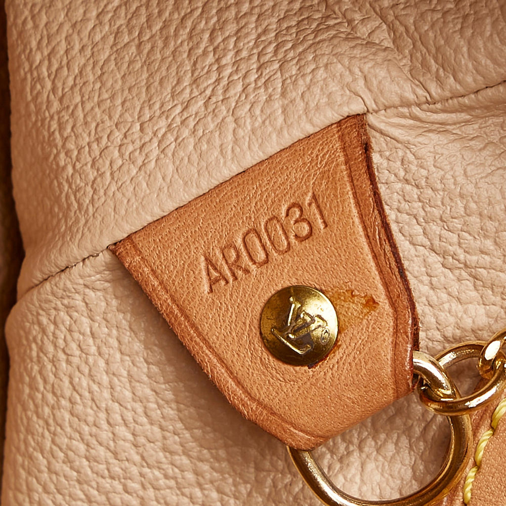 Louis Vuitton Monogram Petit Bucket (SHG-v6zZ4e)