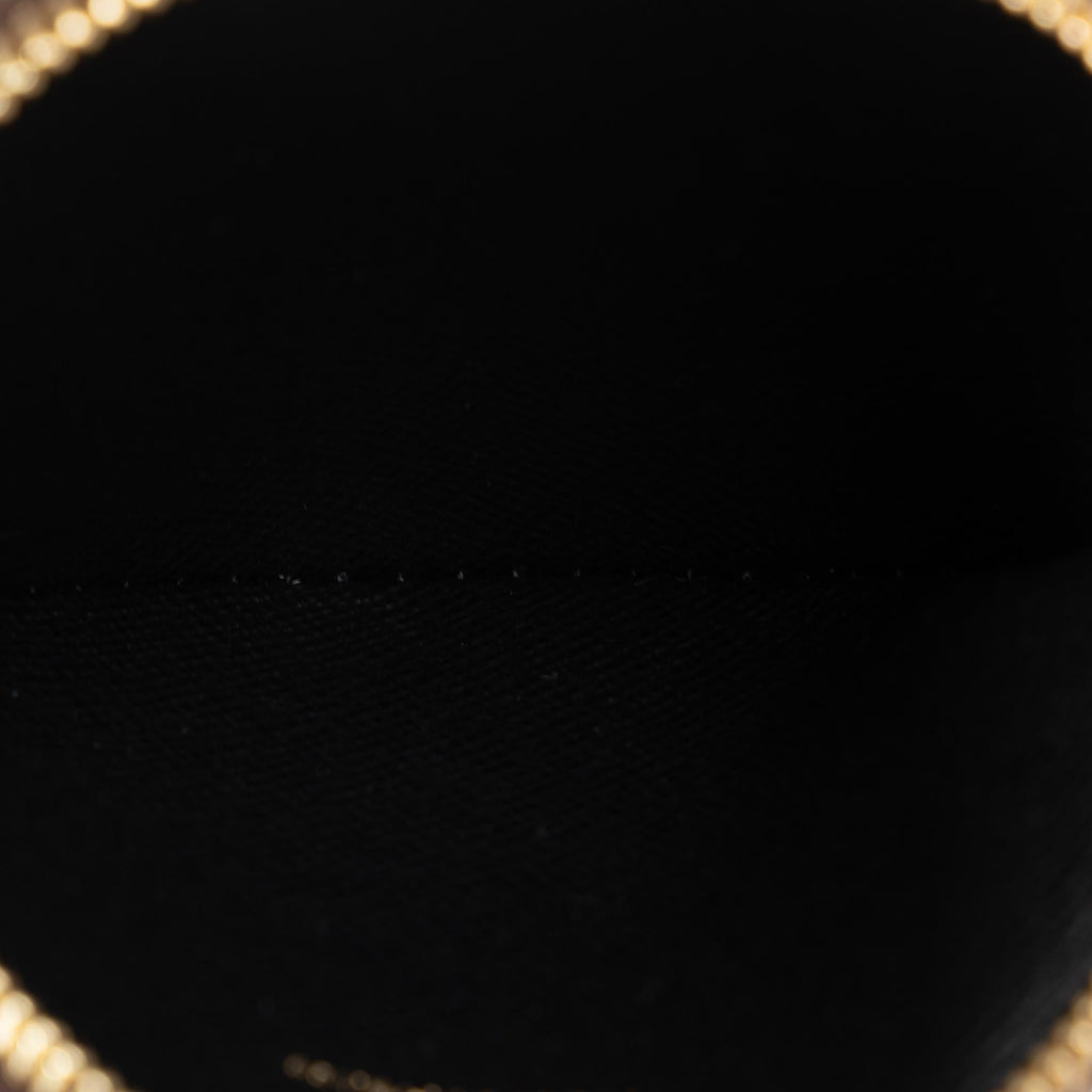 Louis Vuitton Monogram Reverse Giant Trio Pouch (SHG-LrOZZB)