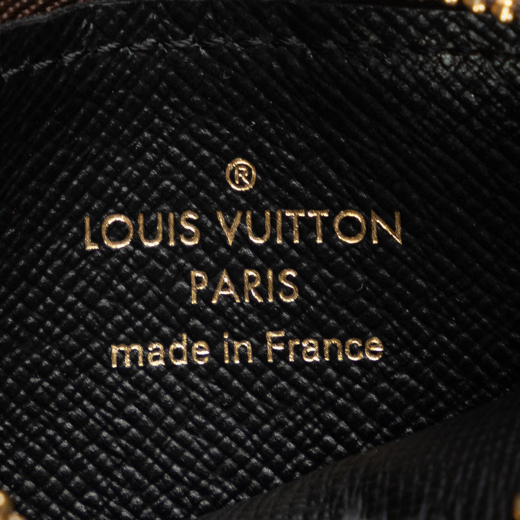 Louis Vuitton Monogram Reverse Giant Trio Pouch (SHG-LrOZZB)