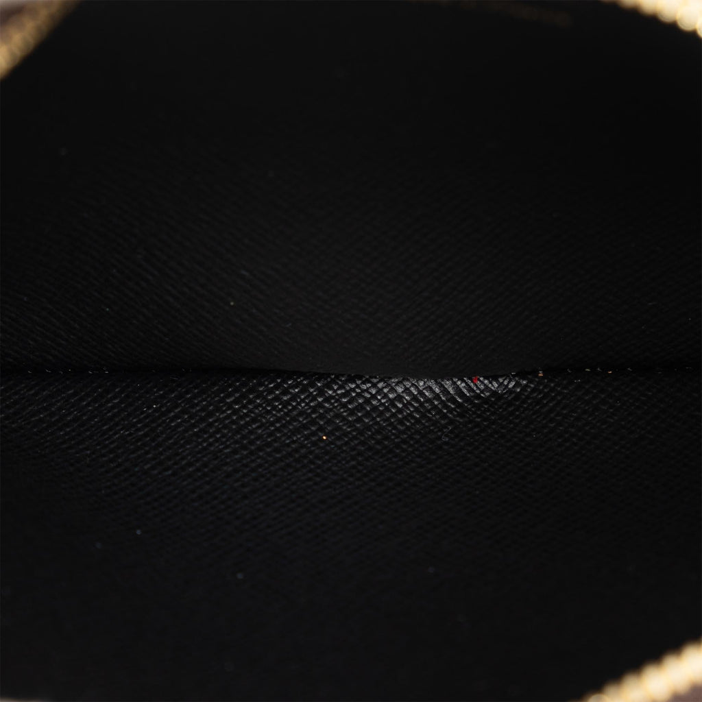Louis Vuitton Monogram Reverse Giant Trio Pouch (SHG-LrOZZB)