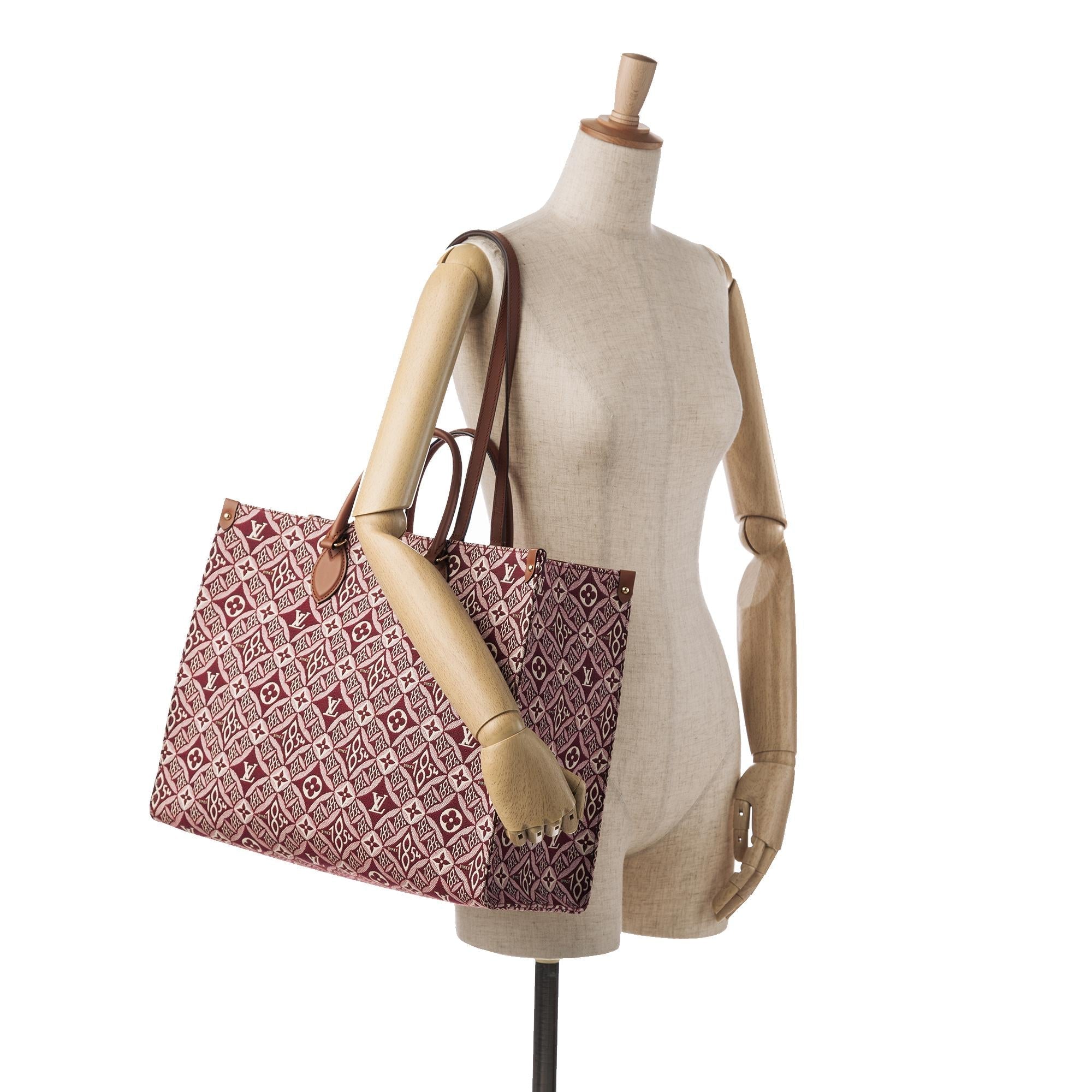 Louis Vuitton Monogram Since 1854 Onthego GM (SHG-6UQaGD)
