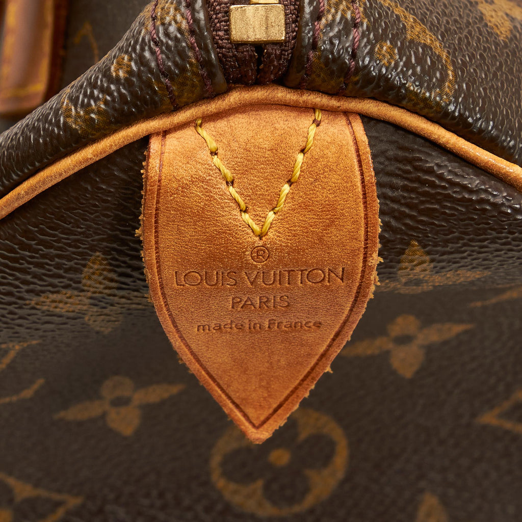 Louis Vuitton Monogram Speedy 25 (SHG-Aw9jM7)