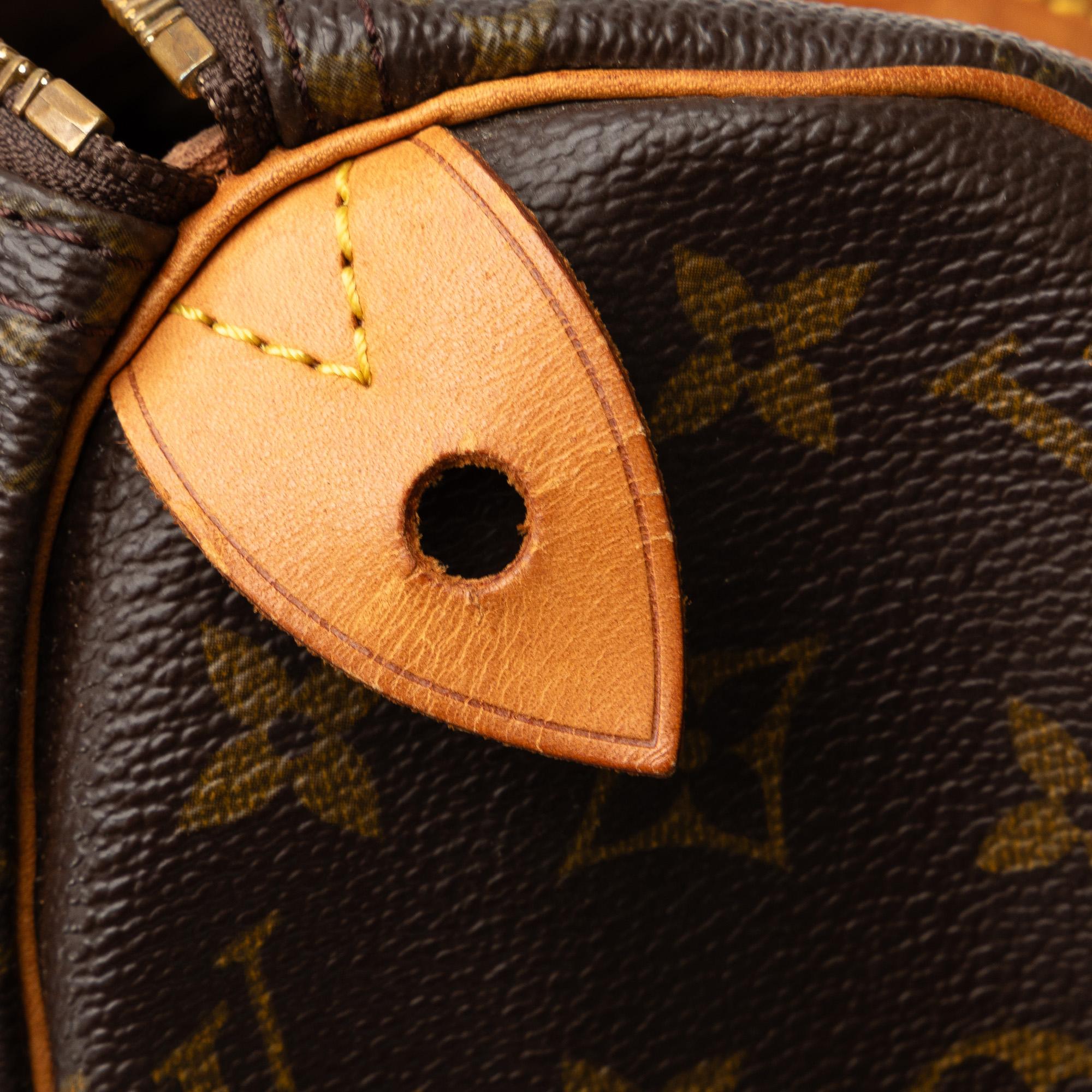Louis Vuitton Monogram Speedy 25 (SHG-Cj1FJh)