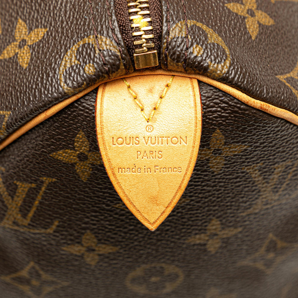 Louis Vuitton Monogram Speedy 25 (SHG-SIJr7r)