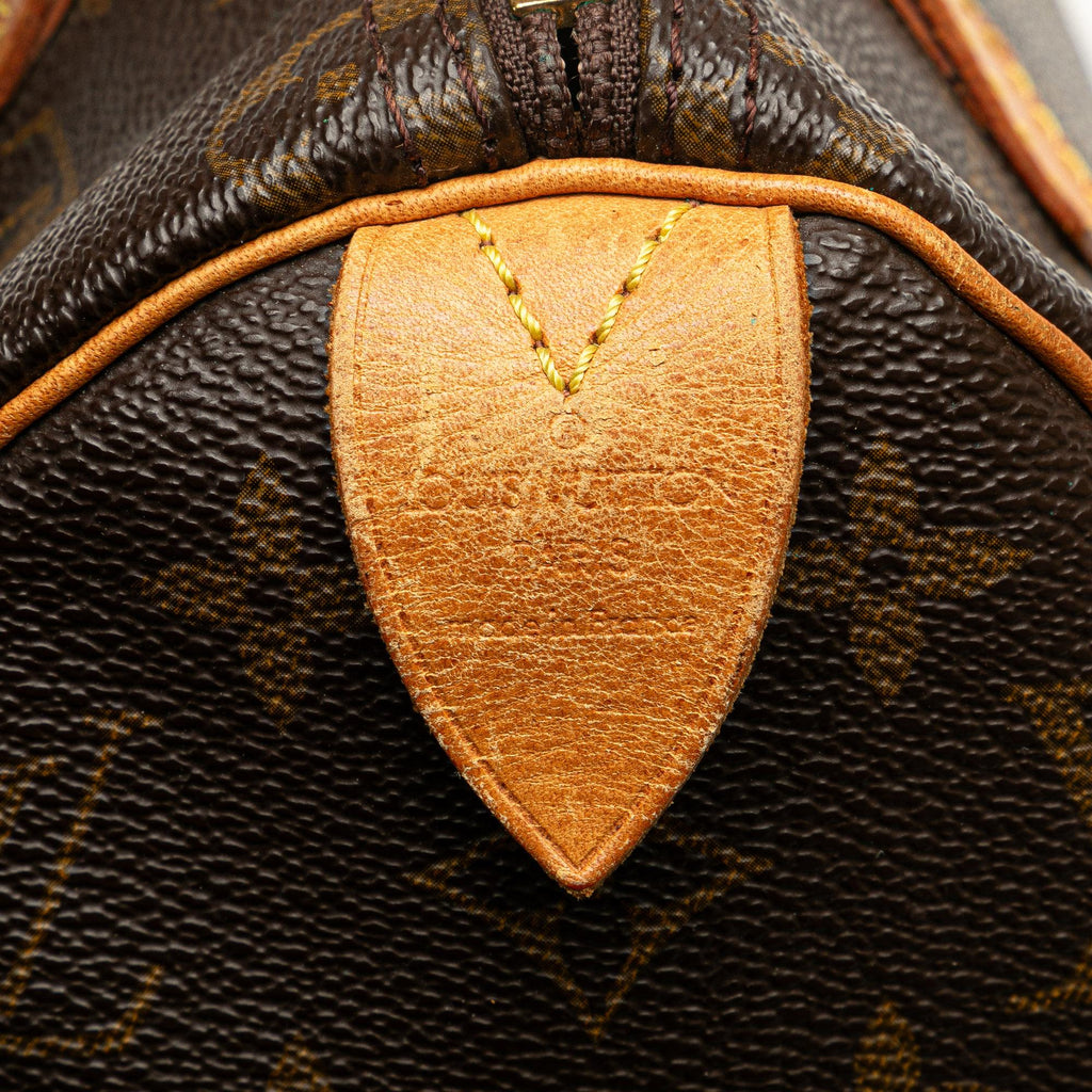 Louis Vuitton Monogram Speedy 25 (SHG-izRi6g)