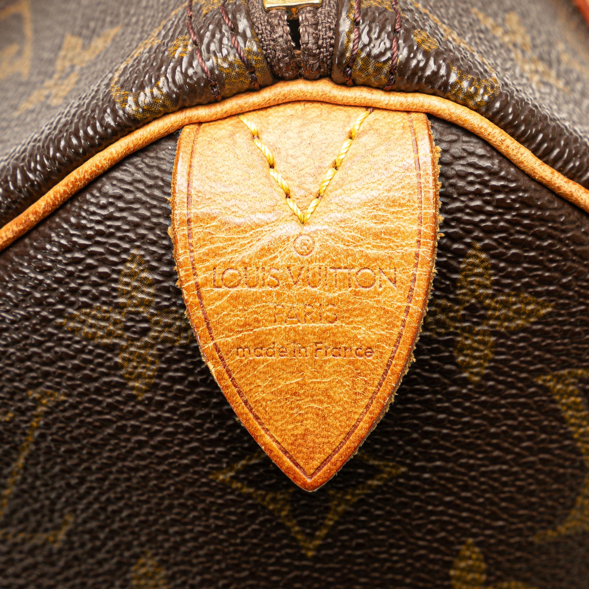 Louis Vuitton Monogram Speedy 25 (SHG-YyNL0k)
