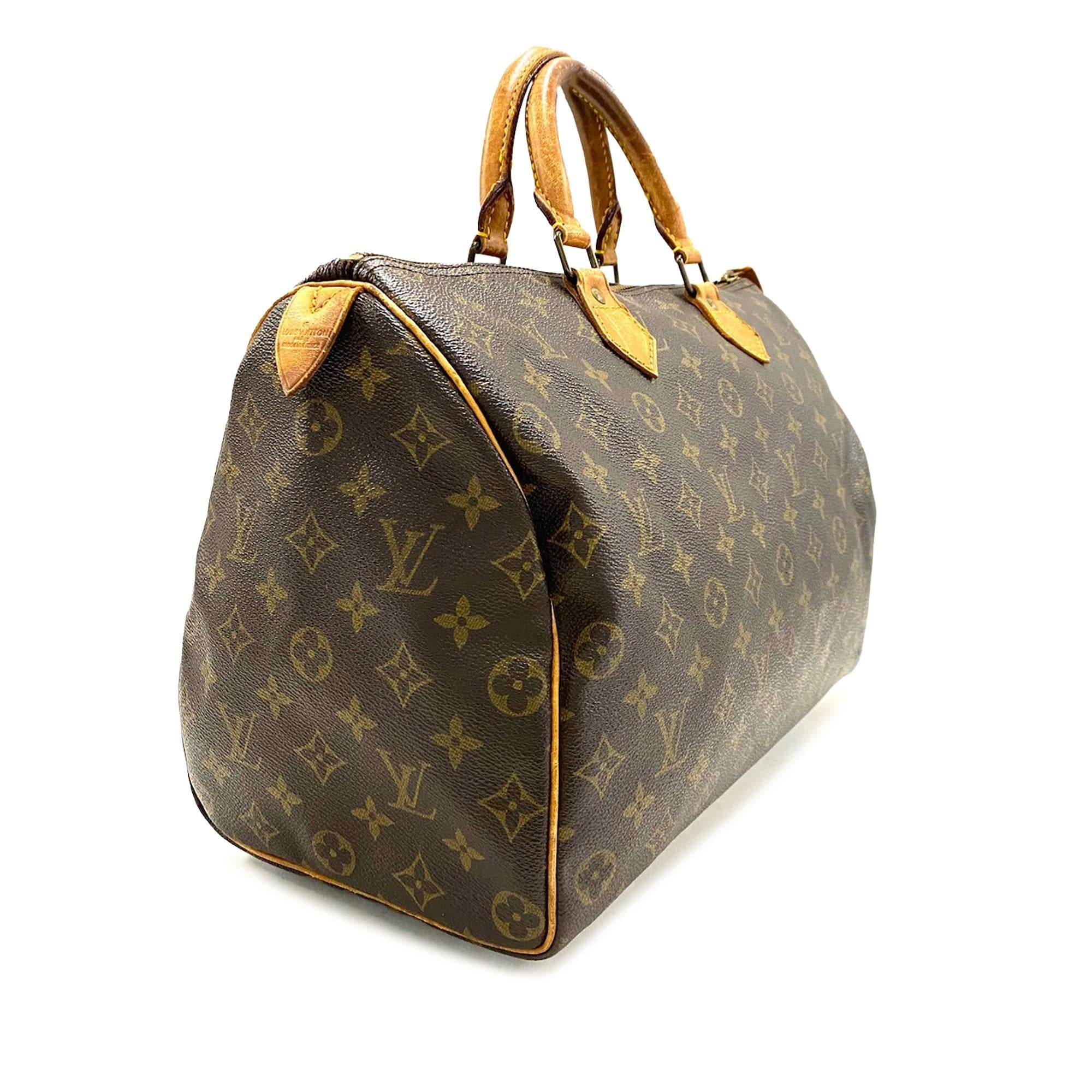Louis Vuitton Monogram Speedy 35 (SHG-PSheuL)