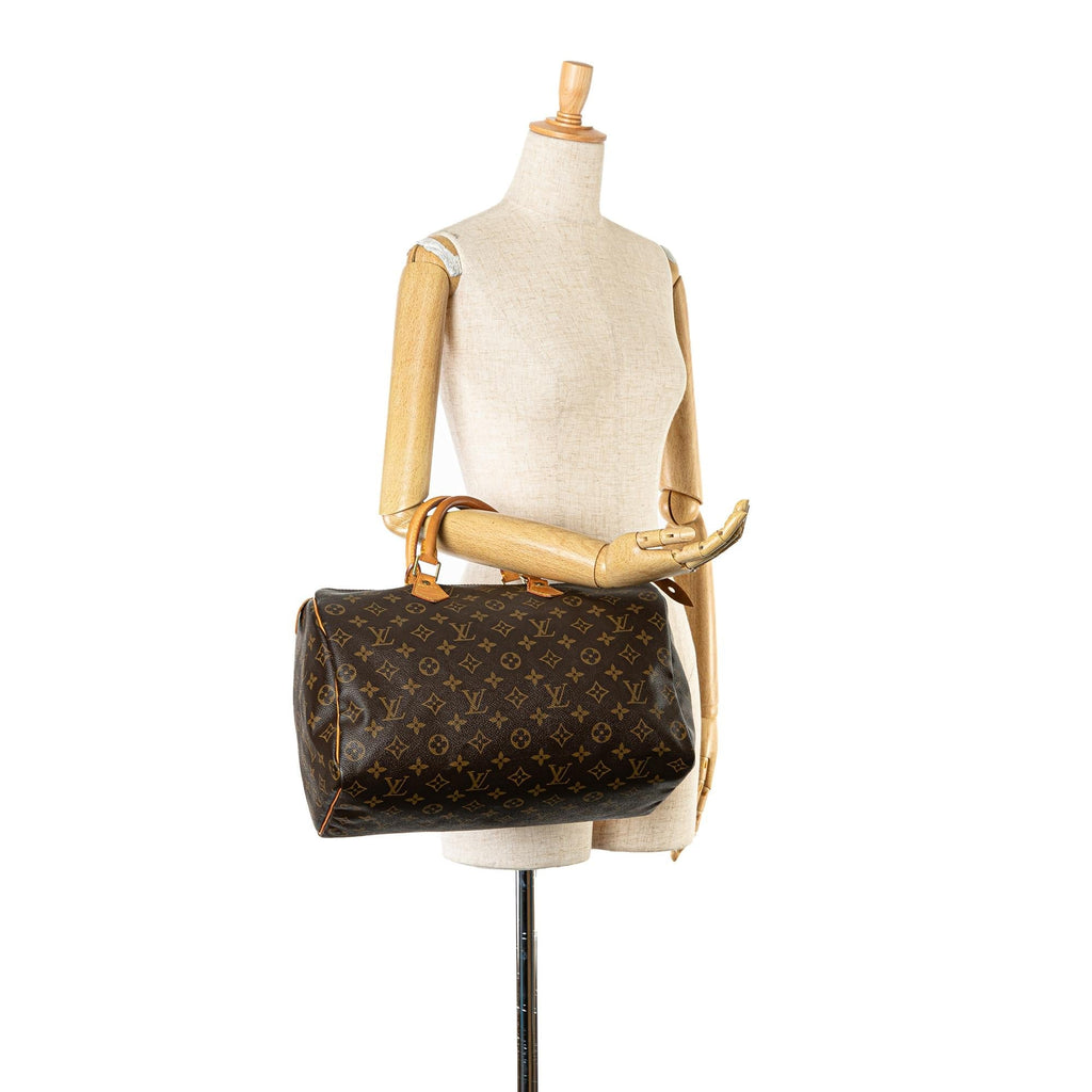 Louis Vuitton Monogram Speedy 35 (SHG-NJk70T)