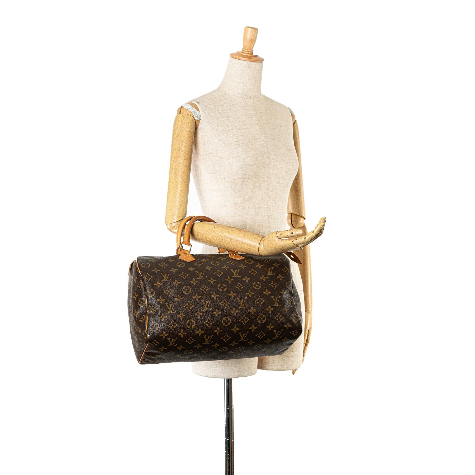 Louis Vuitton Monogram Speedy 35 (SHG-NJk70T)