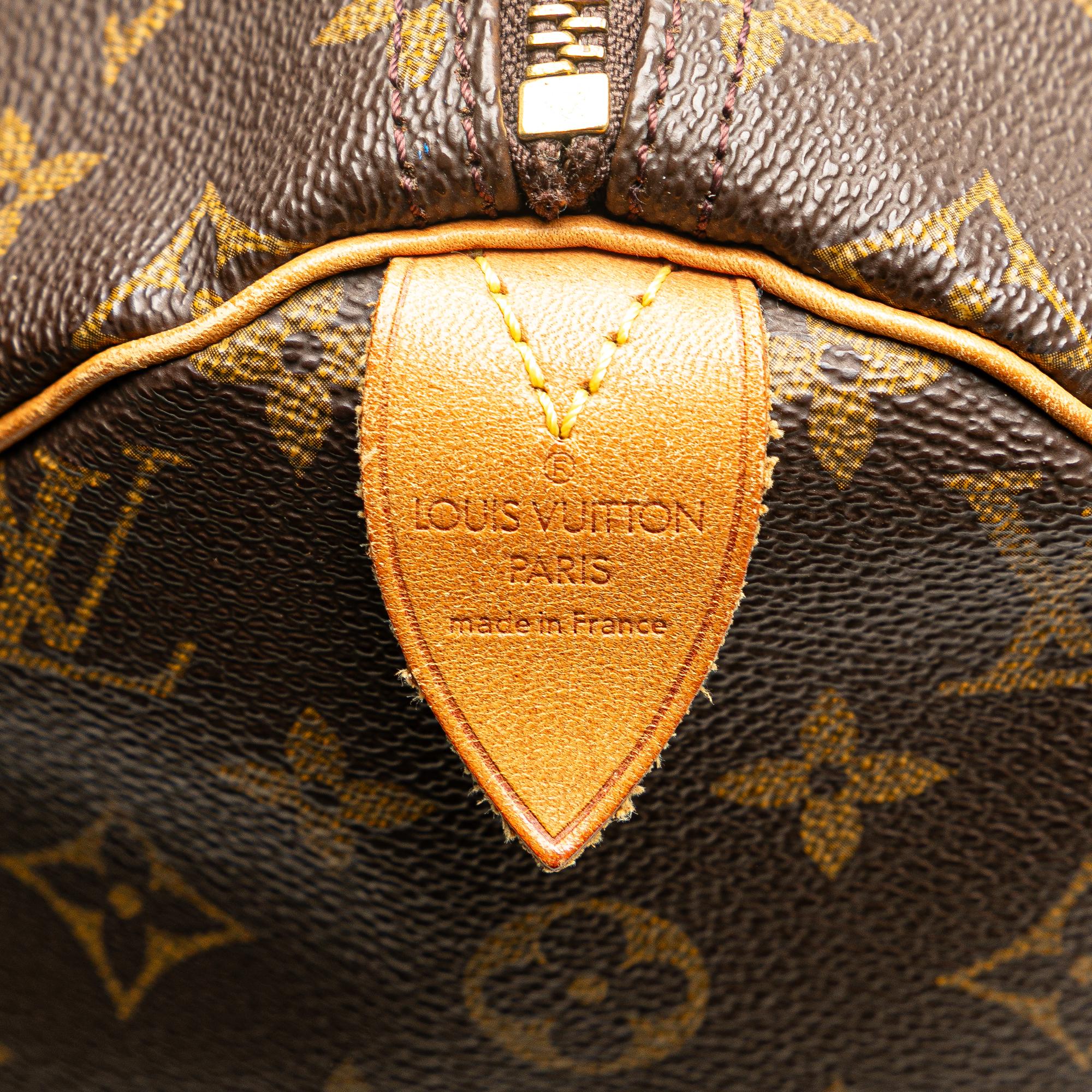 Louis Vuitton Monogram Speedy 40 (SHG-qTBJTL)