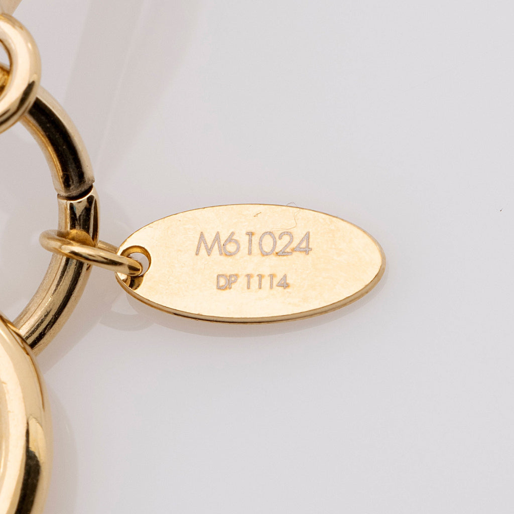 Louis Vuitton Monogram Sphere Bag Charm (SHF-5njVqp)