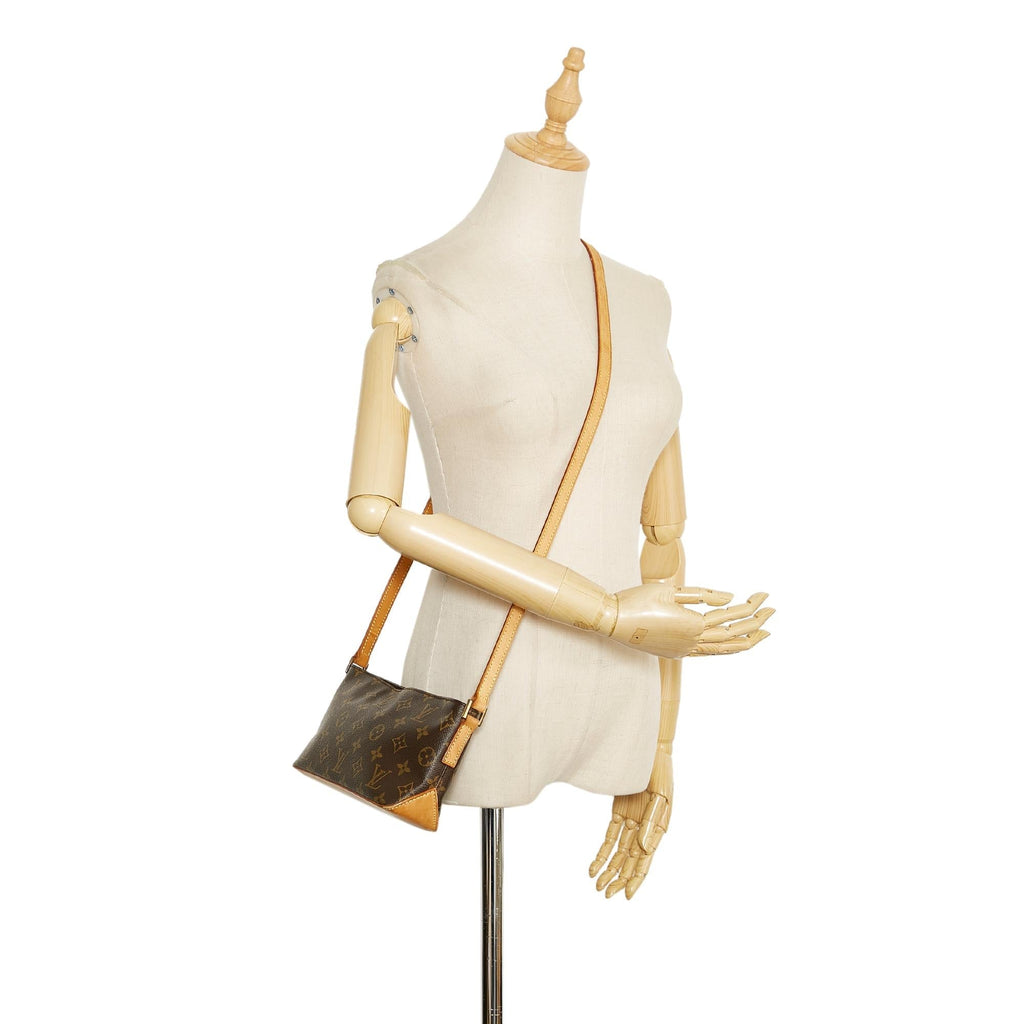 Louis Vuitton Monogram Trotteur (SHG-5v0yiY)