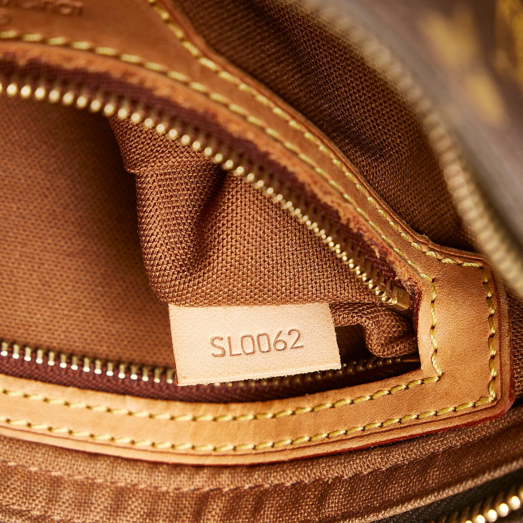 Louis Vuitton Monogram Trotteur (SHG-fqT4ld)
