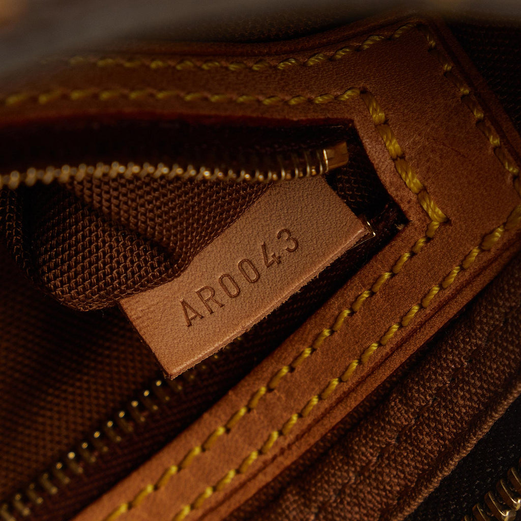 Louis Vuitton Monogram Trotteur (SHG-fngn6l)
