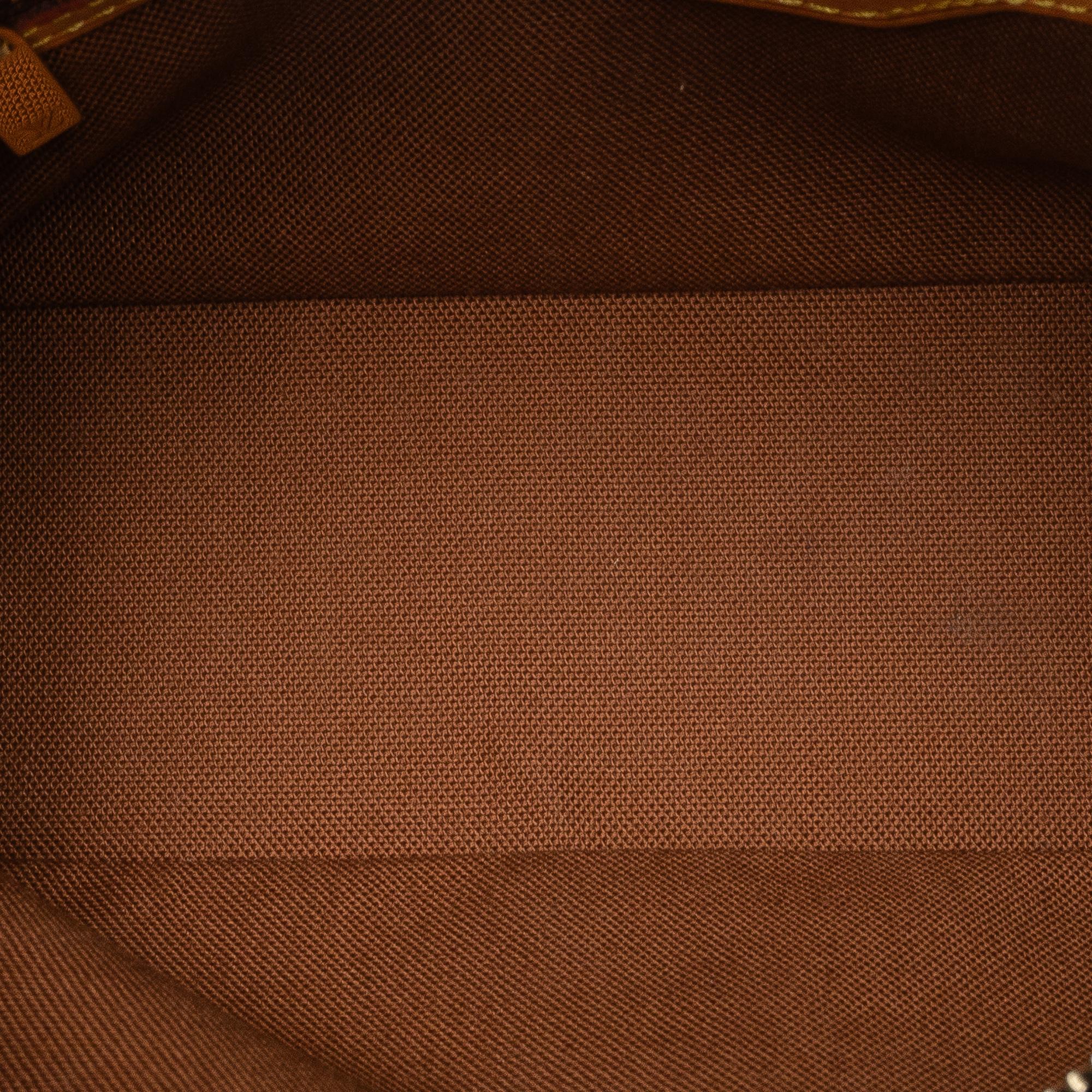 Louis Vuitton Monogram Trotteur (SHG-O7QAi6)