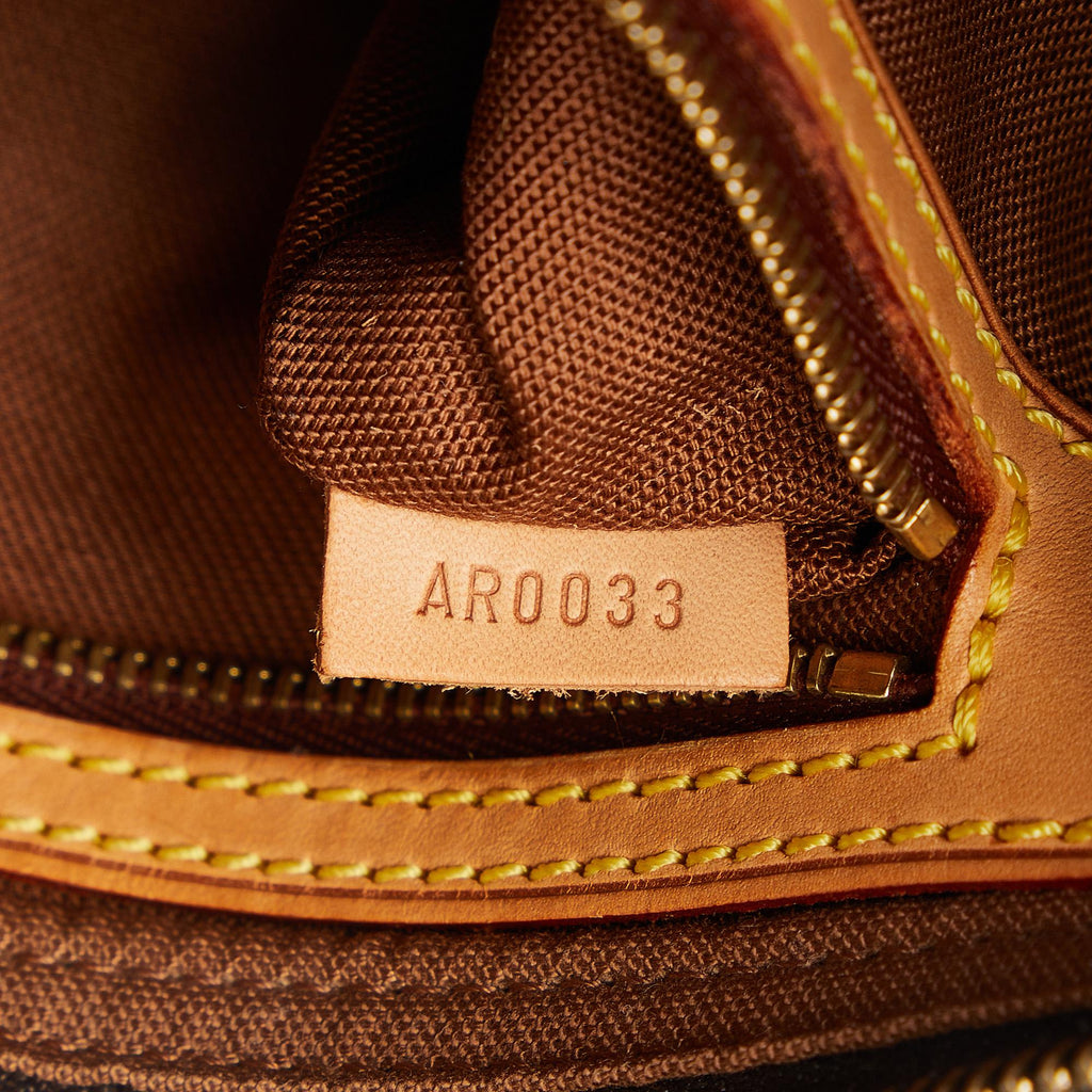 Louis Vuitton Monogram Trotteur (SHG-kxxeIY)